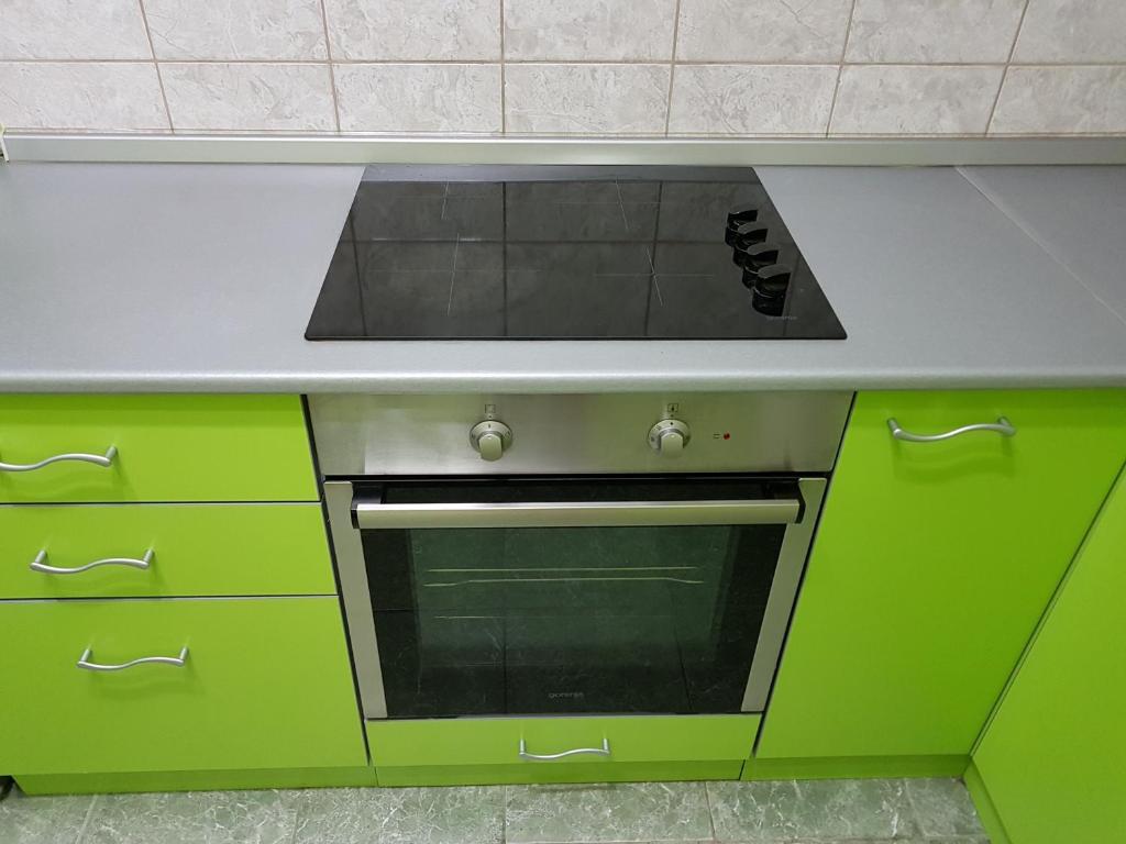 Kuhinja ili čajna kuhinja u objektu Apartment Centar Deluxe