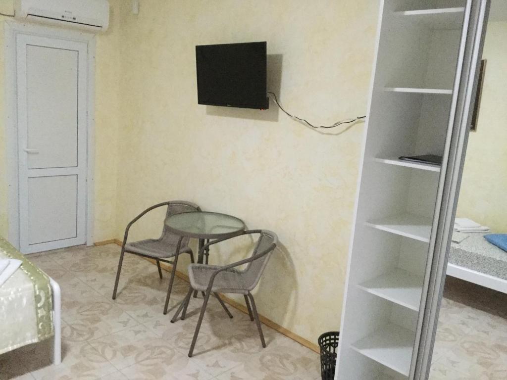 TV a/nebo společenská místnost v ubytování Aura
