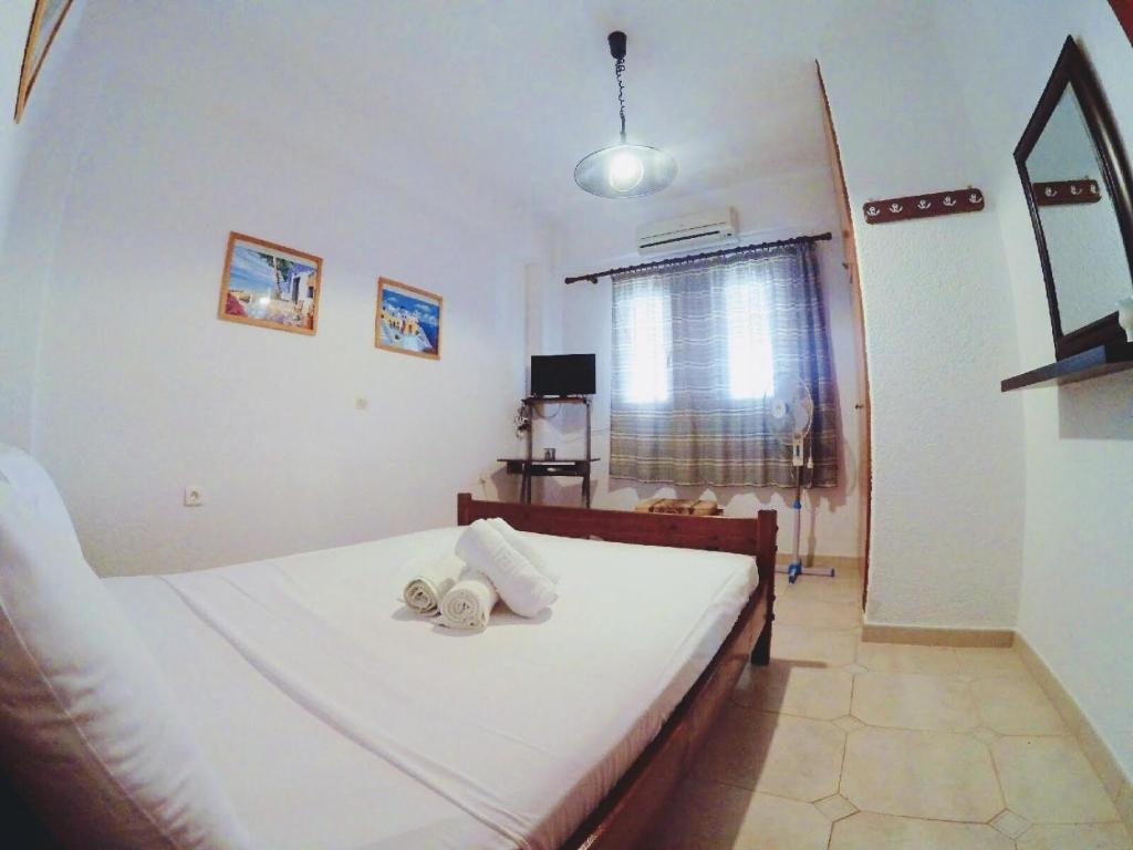 Posteľ alebo postele v izbe v ubytovaní Adonis Villa