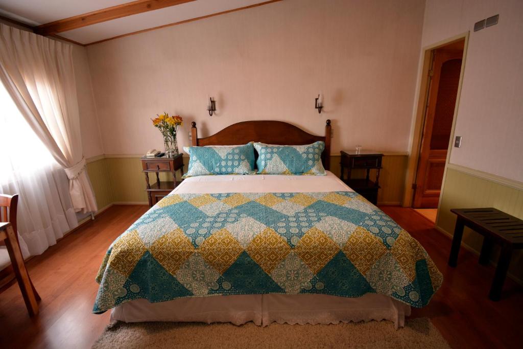 Postel nebo postele na pokoji v ubytování Hotel Di Torlaschi