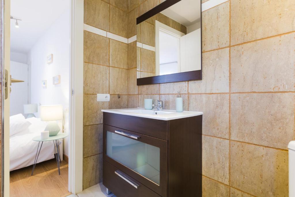 Posteľ alebo postele v izbe v ubytovaní Hola Málaga Centro