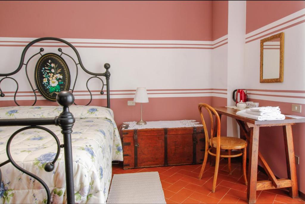 Letto o letti in una camera di B&B Dimora Morelli