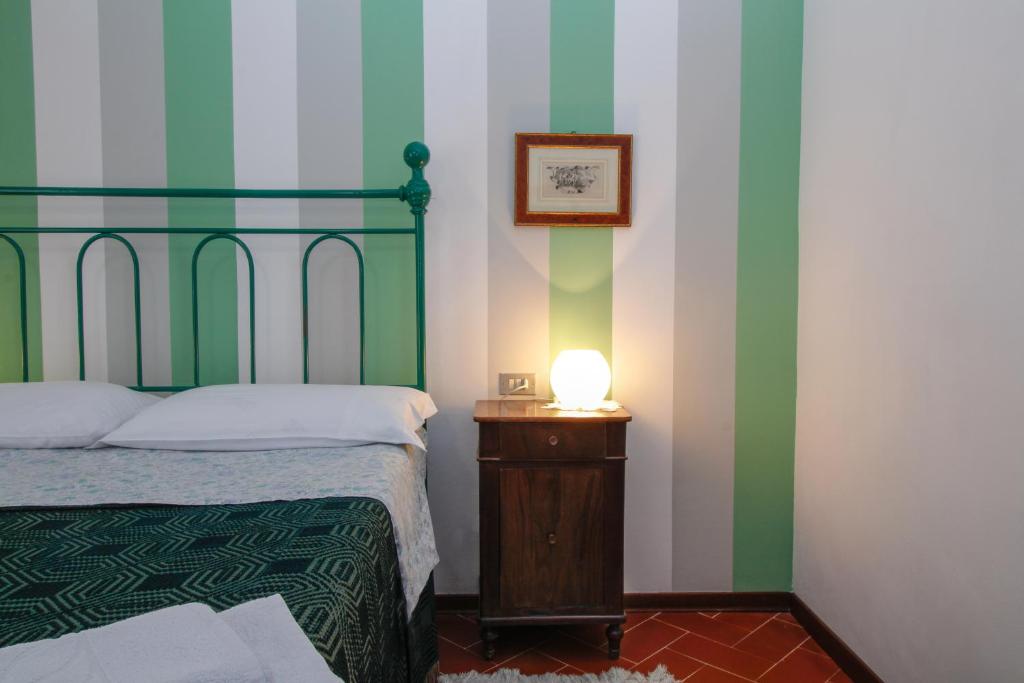 Letto o letti in una camera di B&B Dimora Morelli