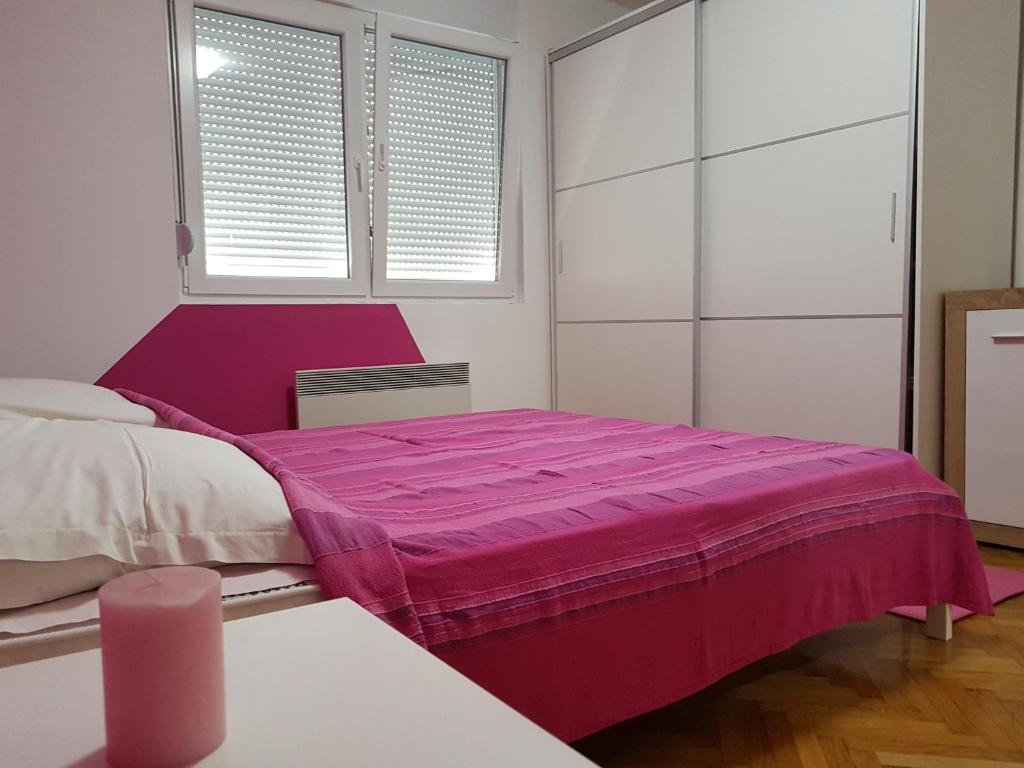 Krevet ili kreveti u jedinici u okviru objekta Apartment Centar Deluxe