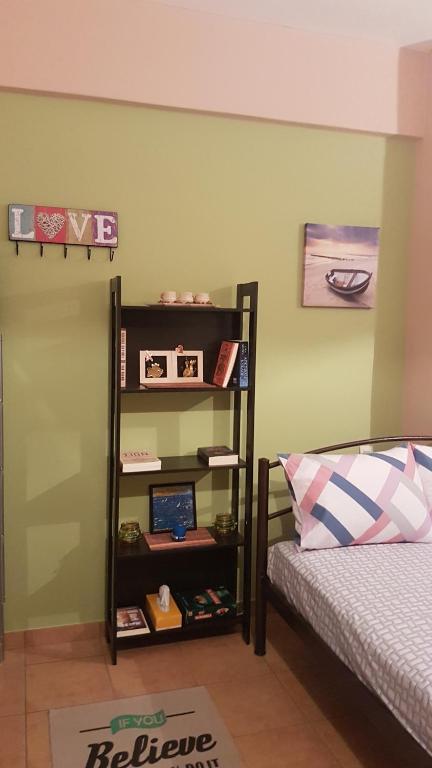 Postel nebo postele na pokoji v ubytování Cozy Loft