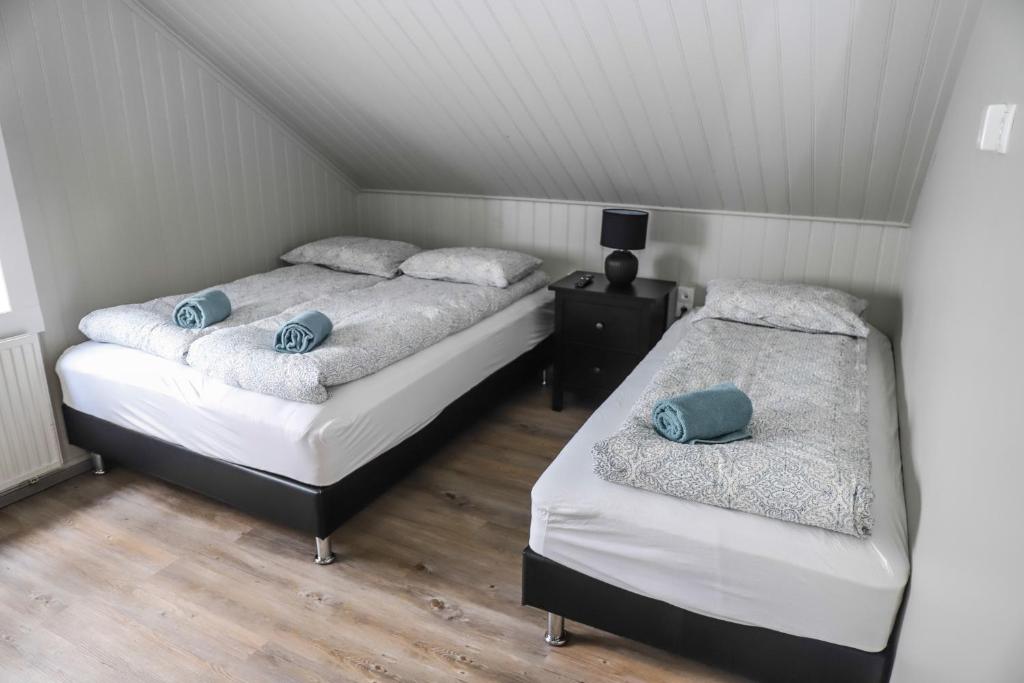 Postel nebo postele na pokoji v ubytování Lava Guesthouse