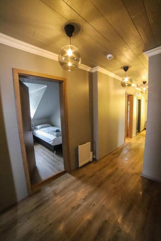 Postel nebo postele na pokoji v ubytování Lava Guesthouse
