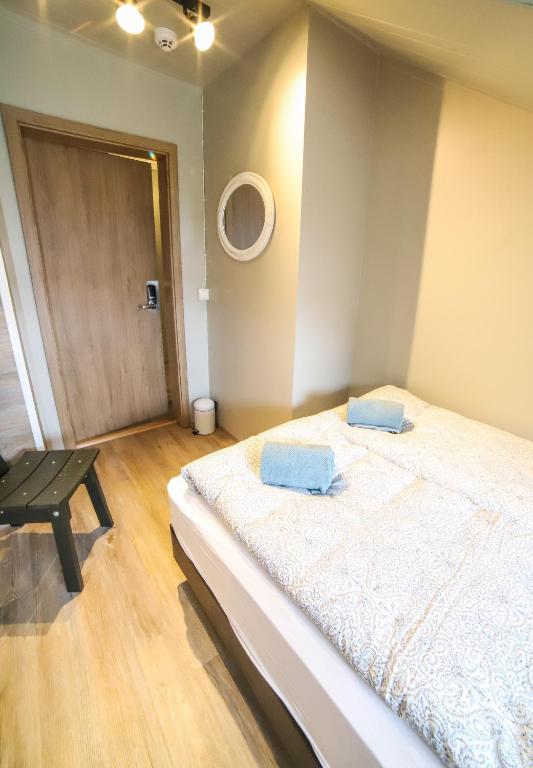Postel nebo postele na pokoji v ubytování Lava Guesthouse