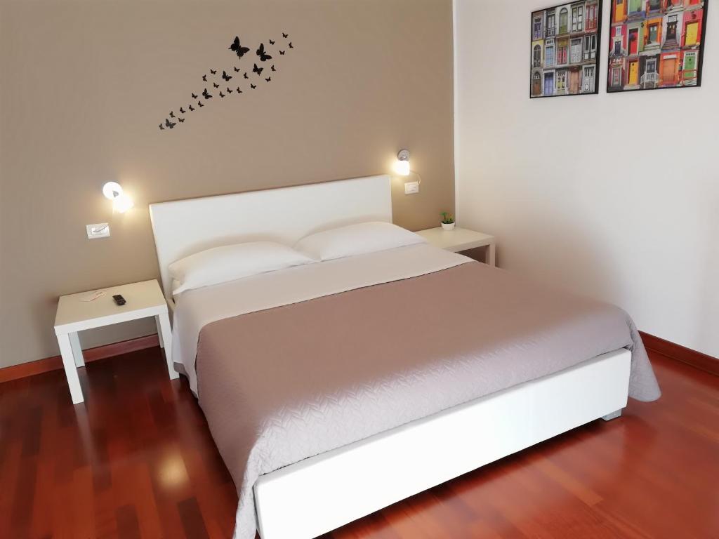 Postel nebo postele na pokoji v ubytování B&B Giulio Cesare