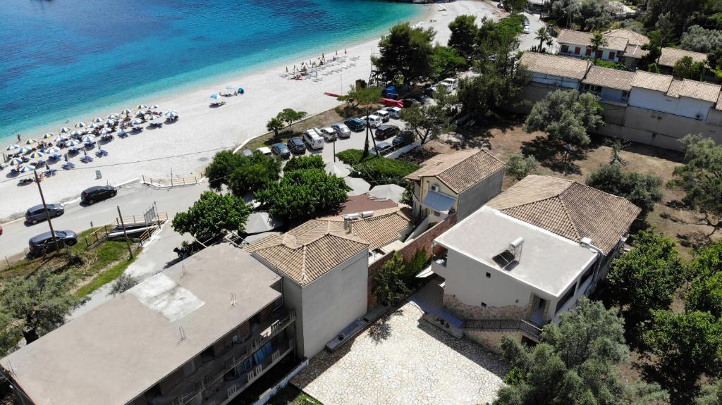 an aerial view of a beach and a building at Ta Kavourakia in Mikros Gialos