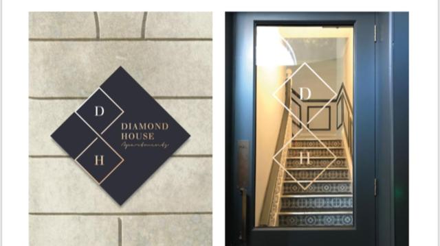 two pictures of a door with a sign on it at Diamond House Apartments in Derry Londonderry