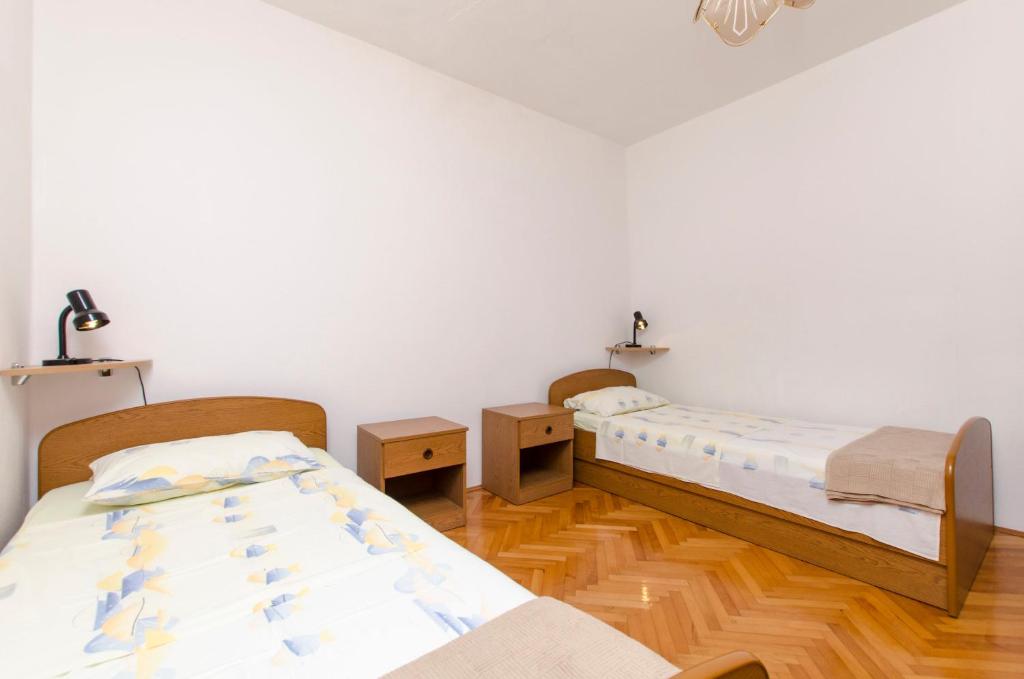 Postel nebo postele na pokoji v ubytování Apartment Danijela