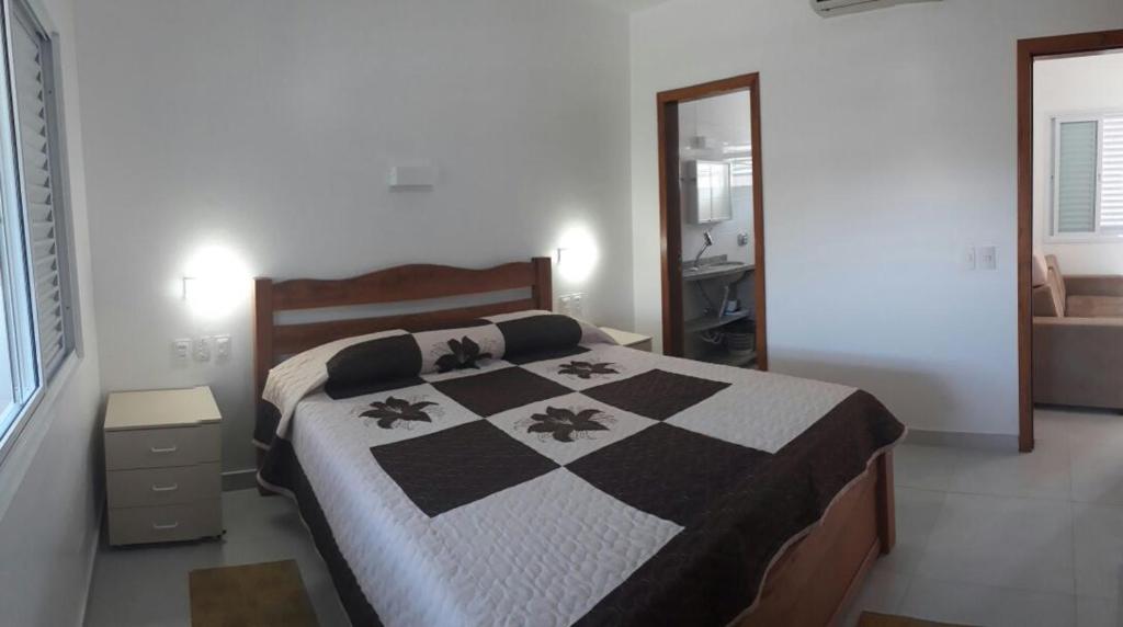 Postel nebo postele na pokoji v ubytování Pousada e Camping Lagoa da Conceição