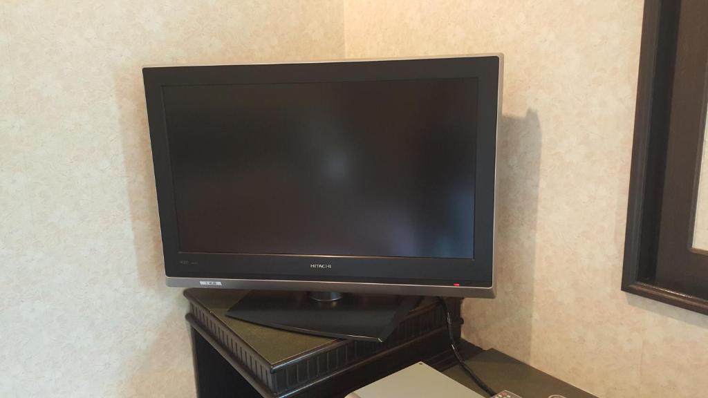 ホテルさんご (大人専用)にあるテレビまたはエンターテインメントセンター