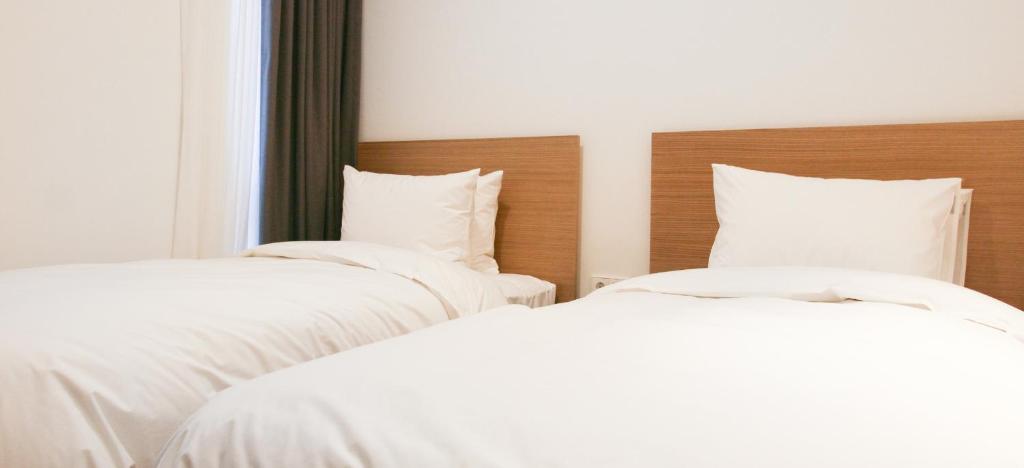 Postel nebo postele na pokoji v ubytování Handpicked Hotel & Collections
