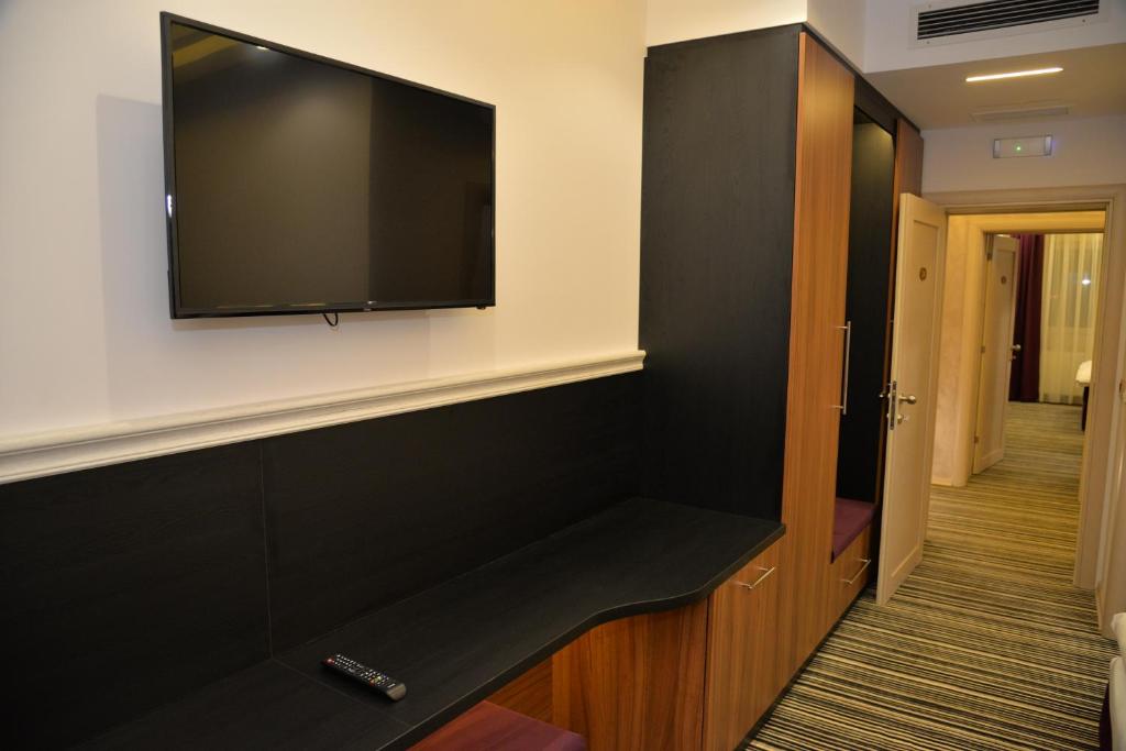 TV a/nebo společenská místnost v ubytování Hotel Prezident