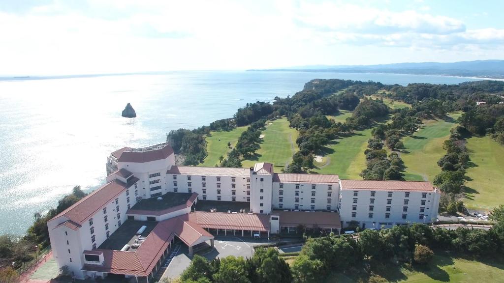 an aerial view of a hotel by the water at Onahama Ocean Hotel & Golf Club in Iwaki