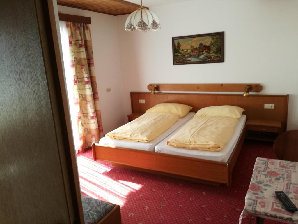 Postel nebo postele na pokoji v ubytování Haus Annemarie