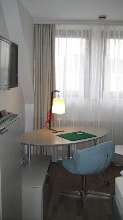 TV a/nebo společenská místnost v ubytování Design Hotel Zollamt
