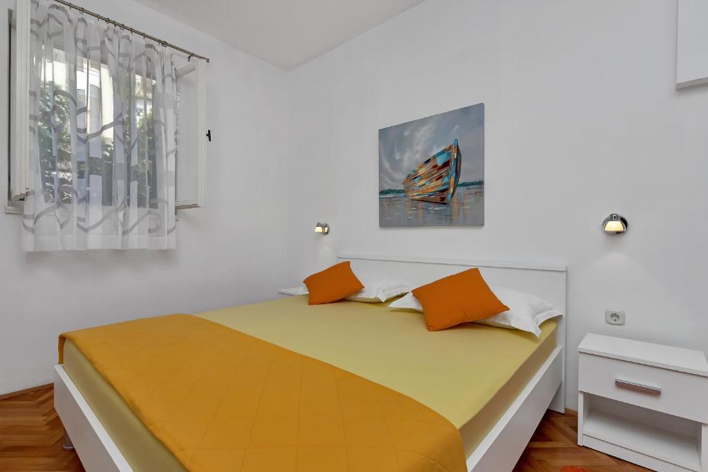 Кровать или кровати в номере Apartments Smiljka