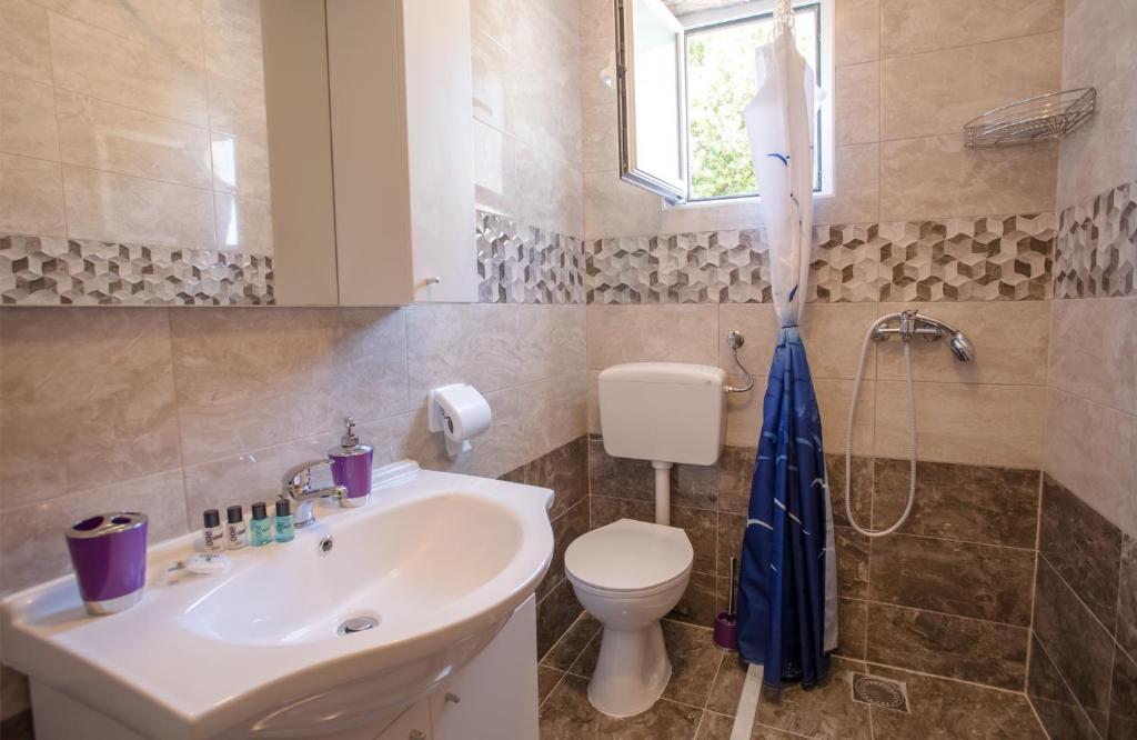 Kúpeľňa v ubytovaní Apartments Dalmatia Blue