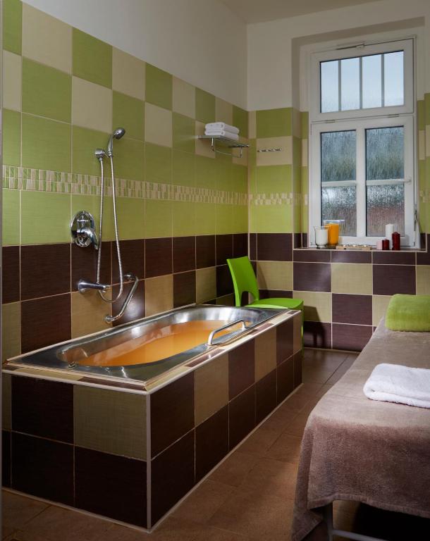 Postel nebo postele na pokoji v ubytování Spa Resort Libverda - Hotel Lesní Zátiší