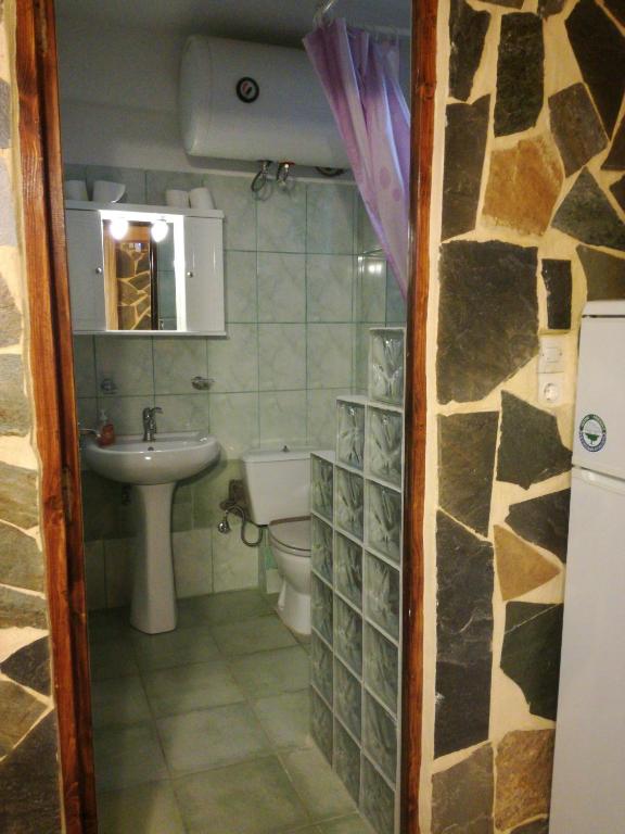 Koupelna v ubytování Apartments Zoumperi