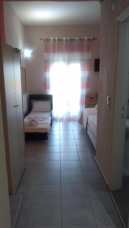 Postel nebo postele na pokoji v ubytování Sunray Apartments