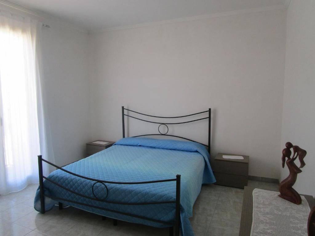 Un ou plusieurs lits dans un hébergement de l'établissement Casa Vacanze Sampieri