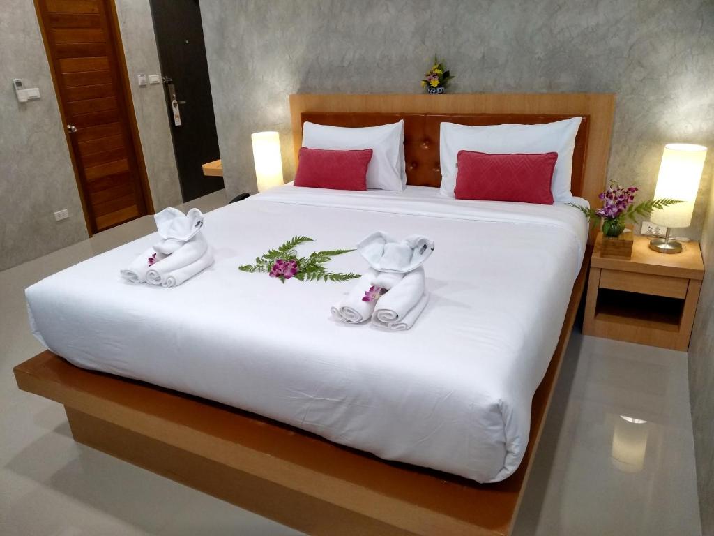 Postel nebo postele na pokoji v ubytování De Loft Hotel
