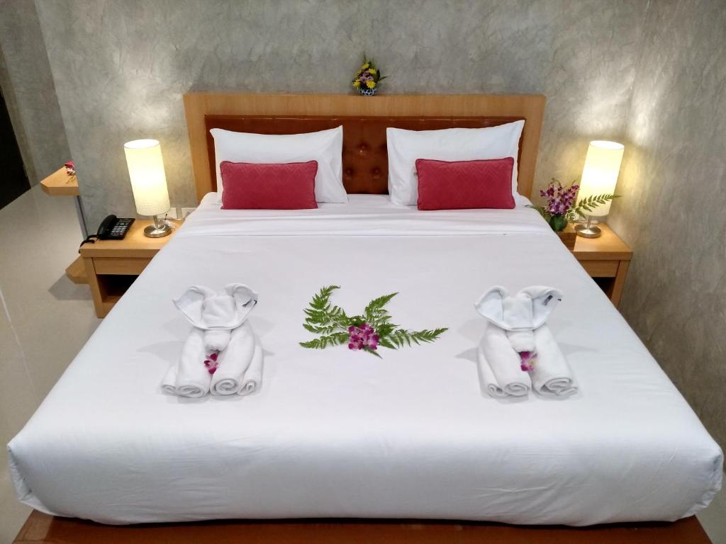 Postel nebo postele na pokoji v ubytování De Loft Hotel