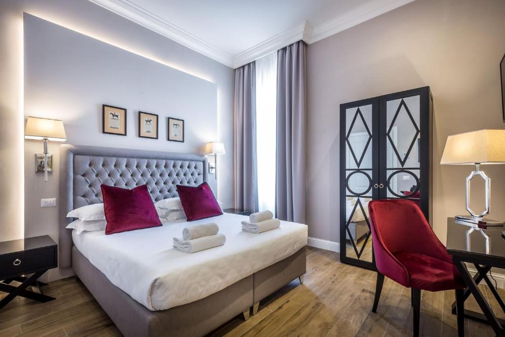 Postel nebo postele na pokoji v ubytování Hotel Emma Small Luxury Hotel