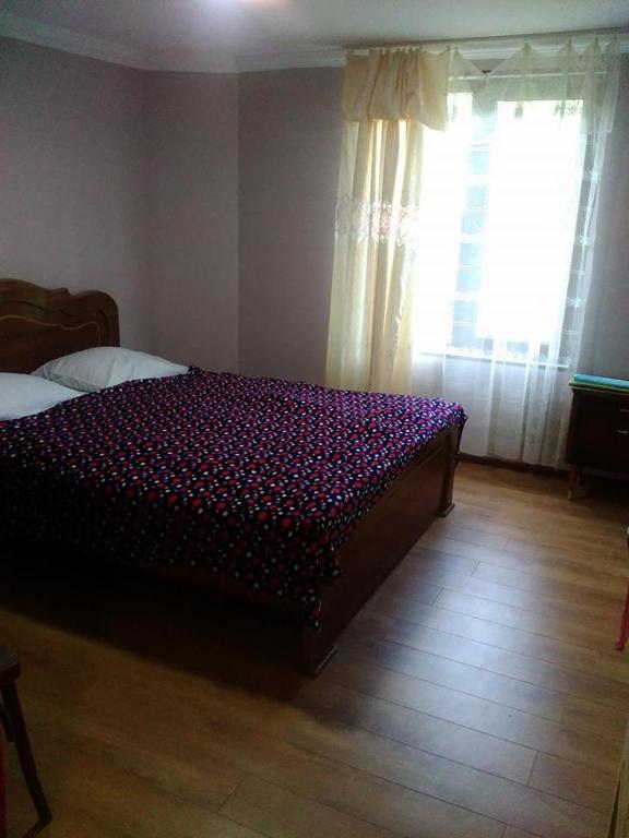 Postel nebo postele na pokoji v ubytování Holiday Home Ekaterine