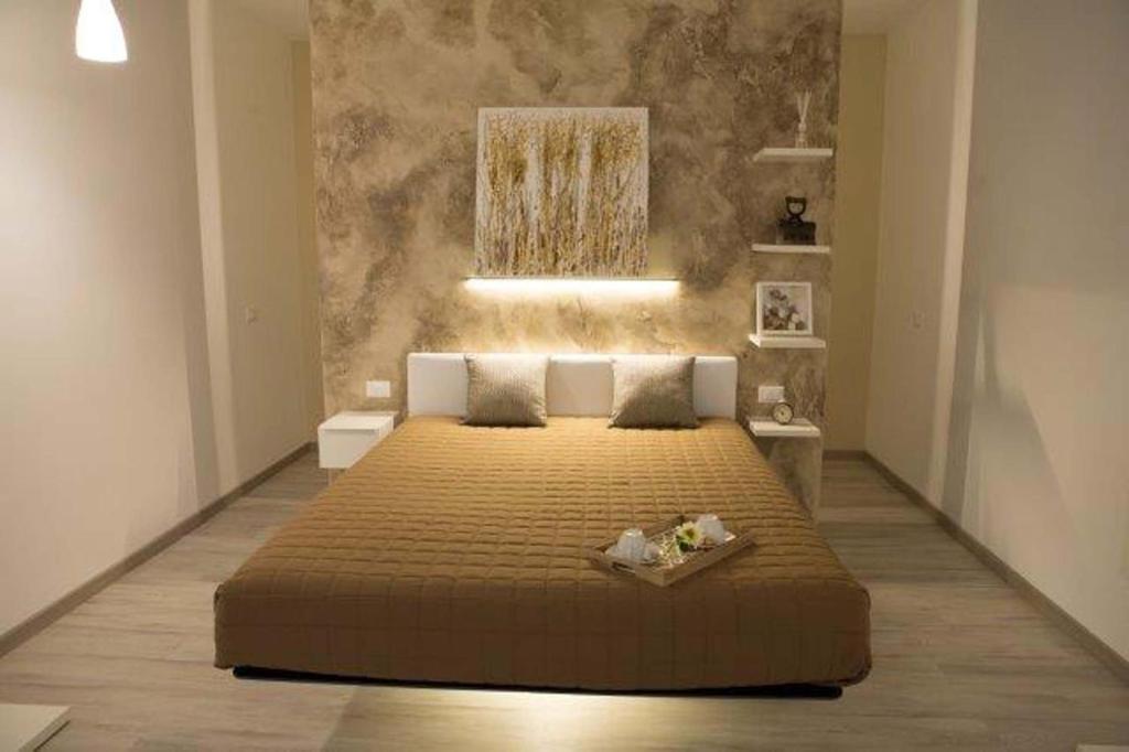 Uma cama ou camas num quarto em Nidi di Feo