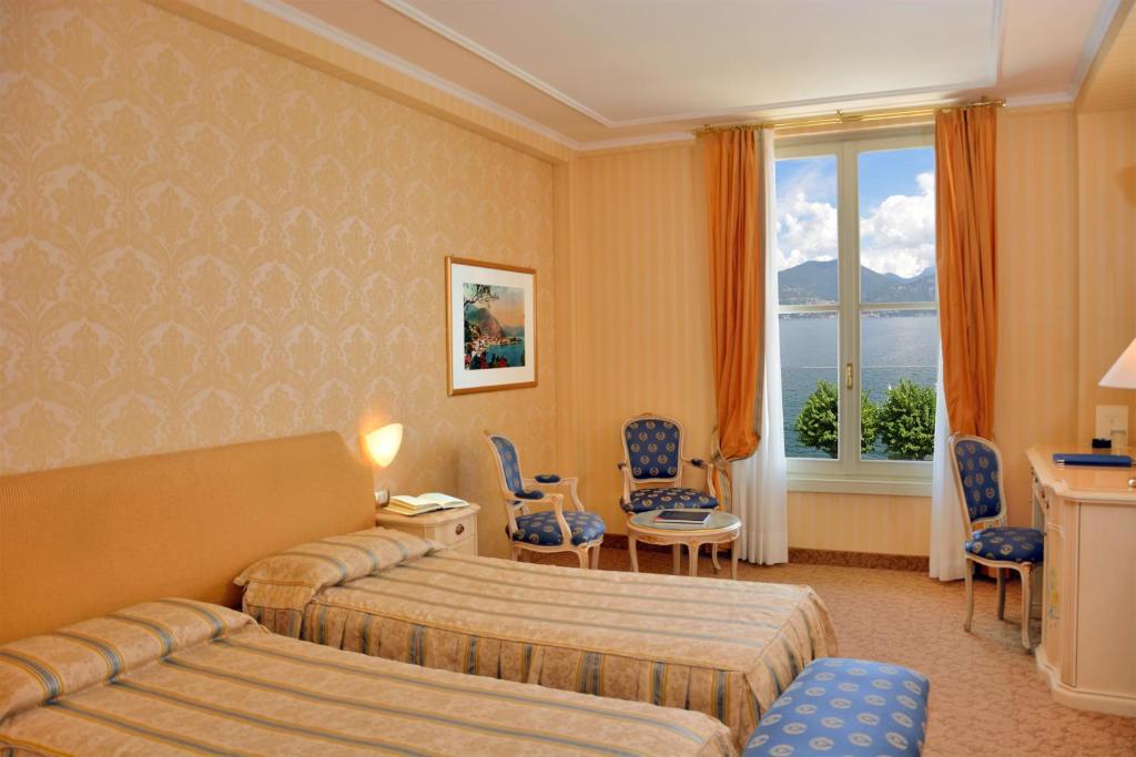 Postel nebo postele na pokoji v ubytování Grand Hotel Menaggio
