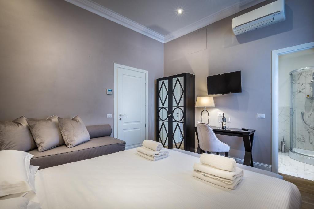 Postel nebo postele na pokoji v ubytování Hotel Emma Small Luxury Hotel