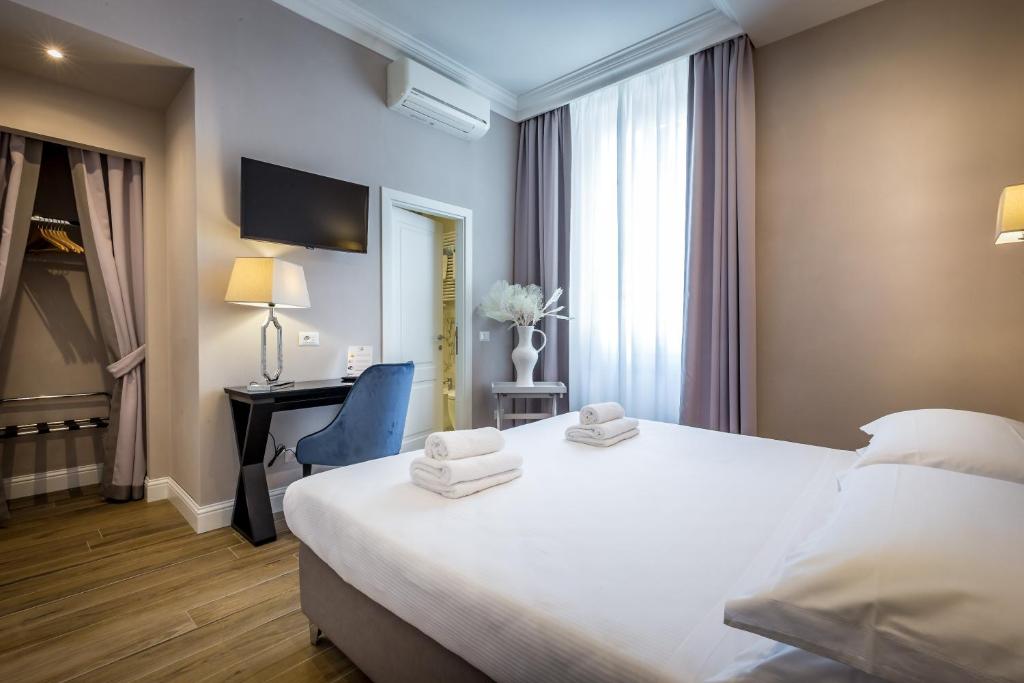 Postel nebo postele na pokoji v ubytování Hotel Emma Small Luxury Hotel