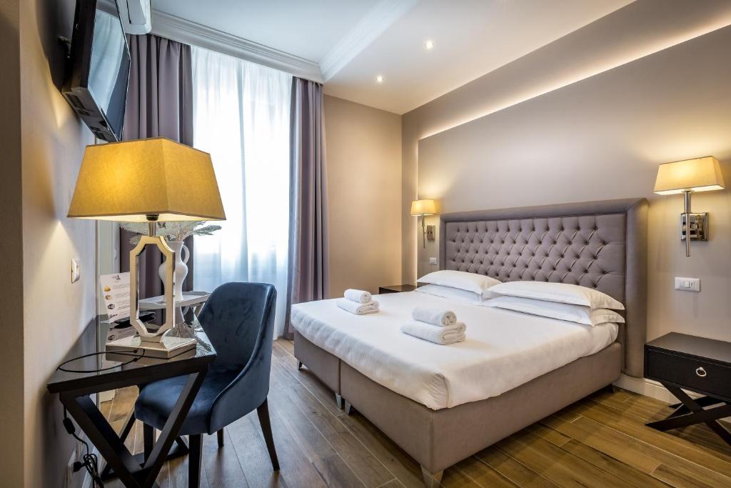 Postel nebo postele na pokoji v ubytování Hotel Emma Small Luxury Hotel