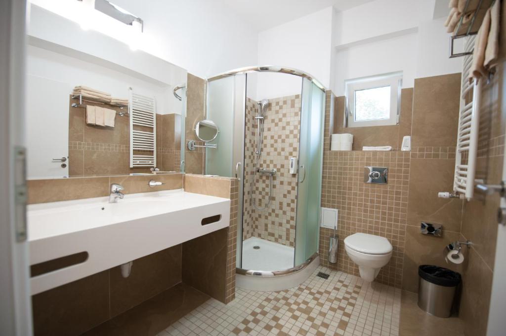 Koupelna v ubytování Bruxelles Guesthouse Craiova