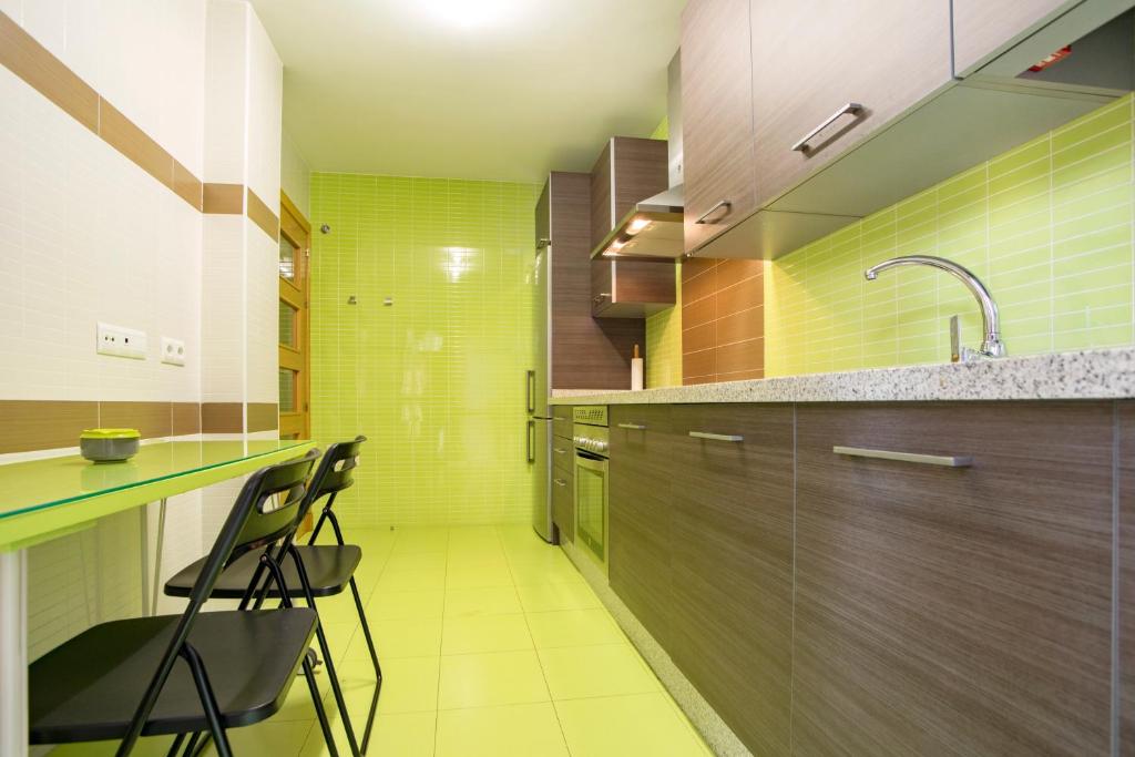 Kuchyňa alebo kuchynka v ubytovaní Livemalaga Apartment & Parking