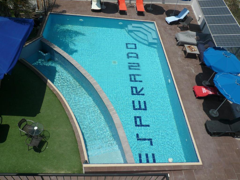 an overhead view of a swimming pool at Esperando in Maroni