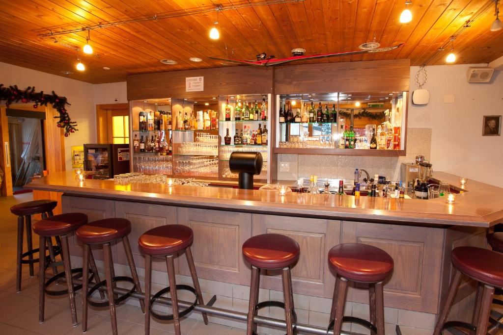 A área de bar ou lounge em Hotel Jungfrau Mürren