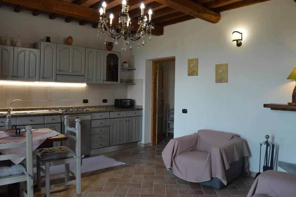 Kuchyň nebo kuchyňský kout v ubytování Villa Perugini