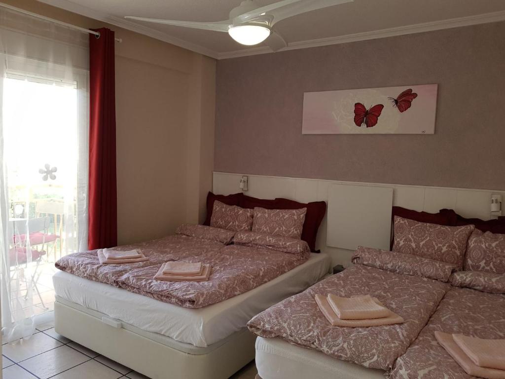 Cama o camas de una habitación en Kristie Apartment
