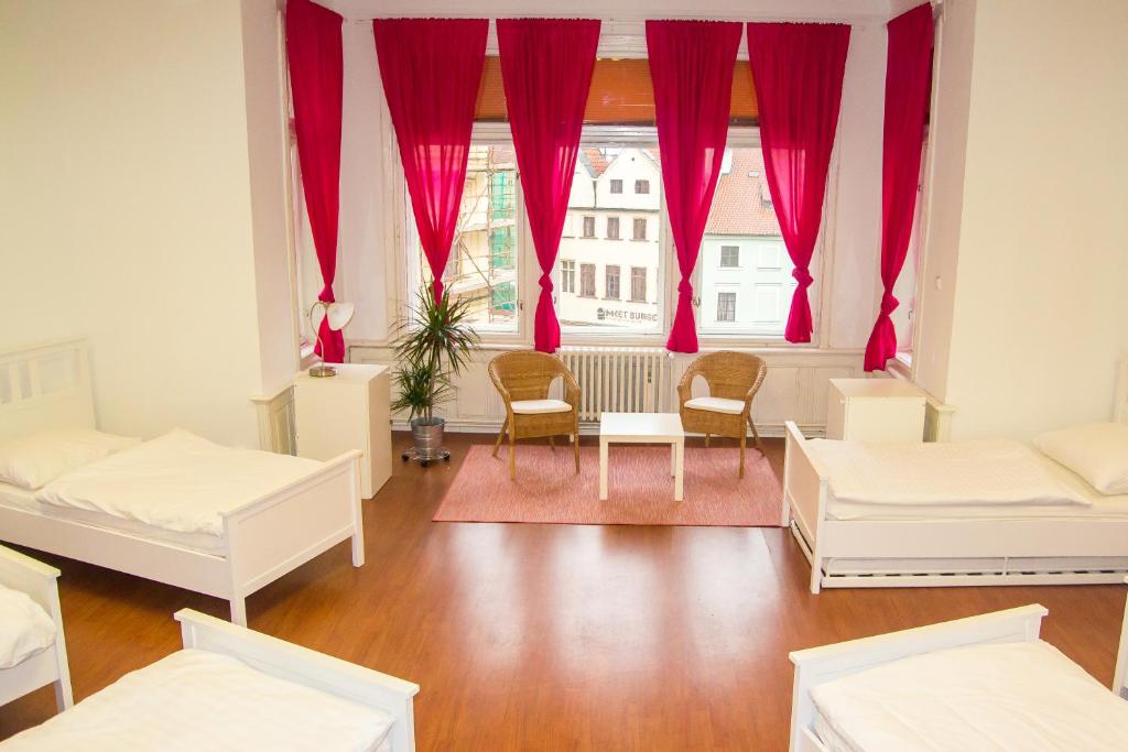 Una cama o camas en una habitación de Hostel Franz Kafka