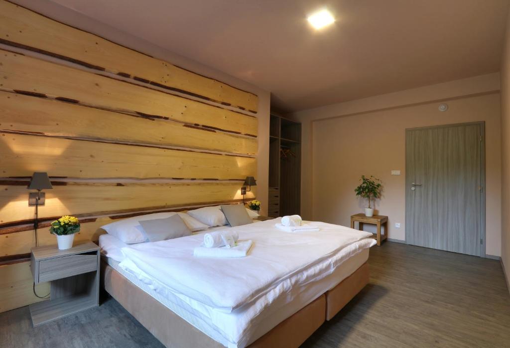 Una cama o camas en una habitación de Hotel Obzor