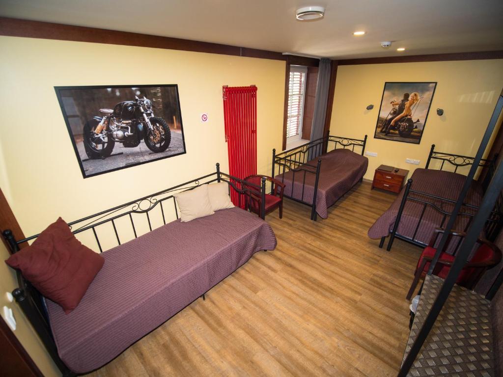 Voodi või voodid majutusasutuse Aleksandri Guesthouse toas
