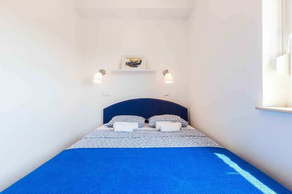 Postel nebo postele na pokoji v ubytování Villa Ria