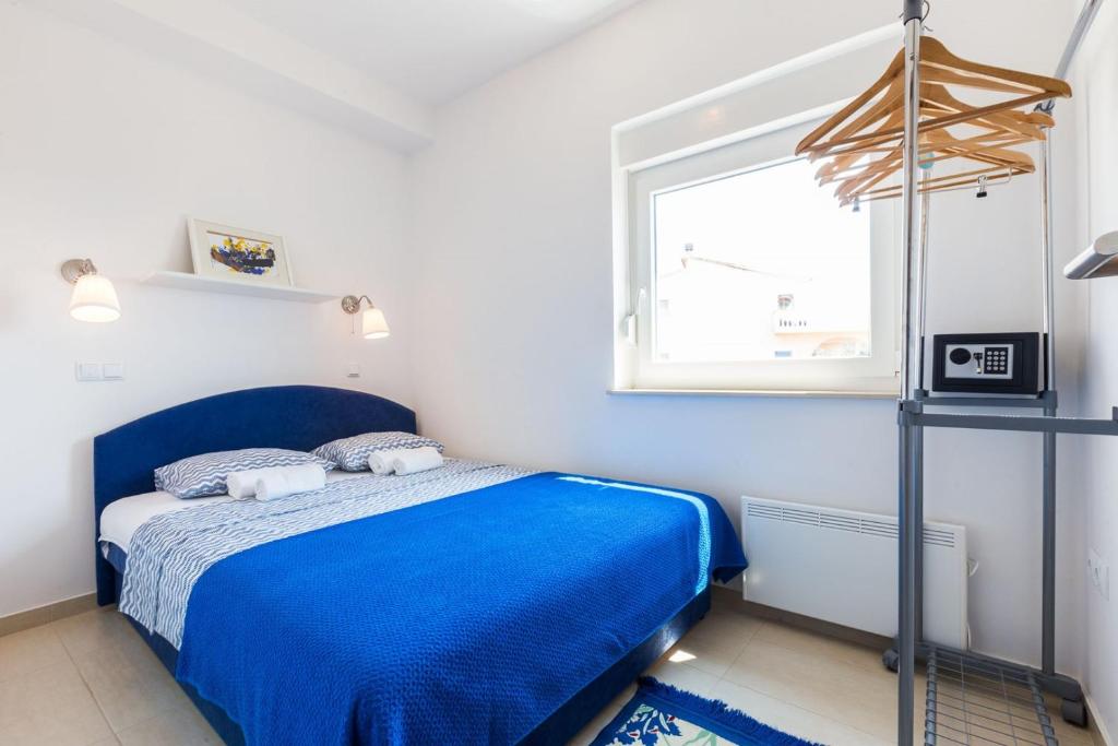 Postel nebo postele na pokoji v ubytování Villa Ria
