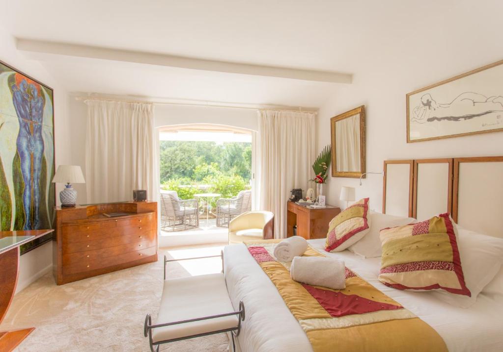 Postel nebo postele na pokoji v ubytování Hotel Le Verger Maelvi